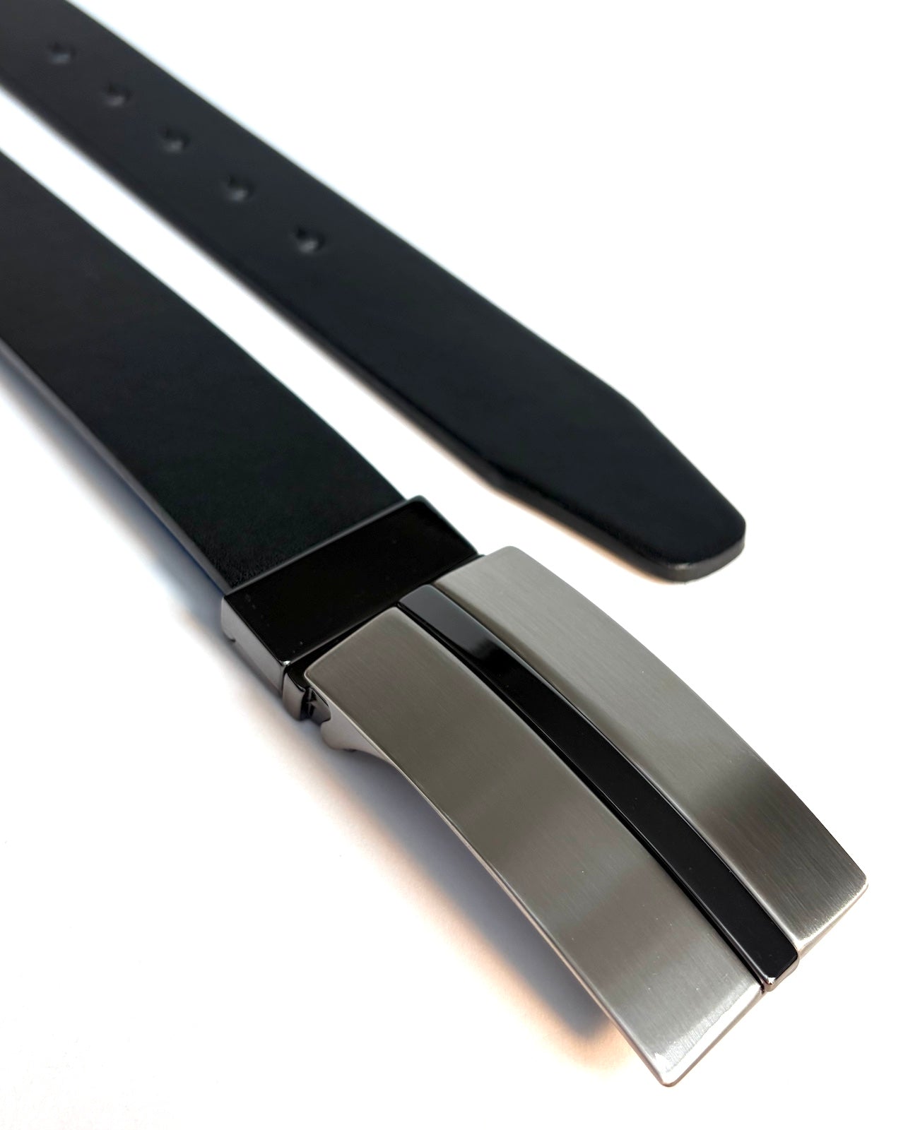 Black belt with a silver buckle on a white background
