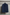Dark blue suit jacket hanging on a hanger against a light background