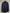 A dark navy blue long-sleeve button-down shirt hanging on a wooden hanger against a textured concrete wall.