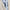 Light grey suit jacket with light blue dress shirt and tie.