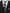 Black suit jacket with a white shirt and striped tie.