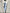 Light grey suit jacket with a white shirt and blue tie
